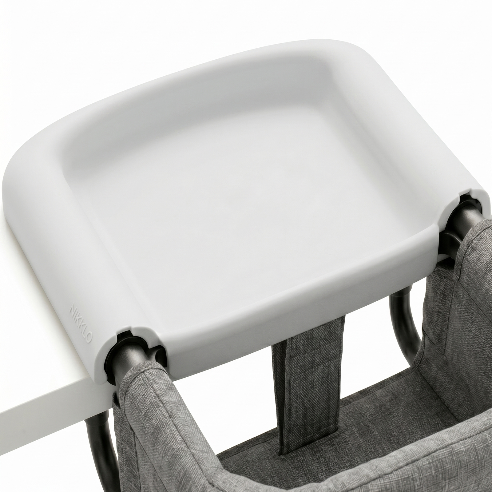 Nikklo silicone tray on a hook-on chair